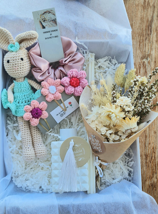 Crochet toy rabbit gift box with dried flowers